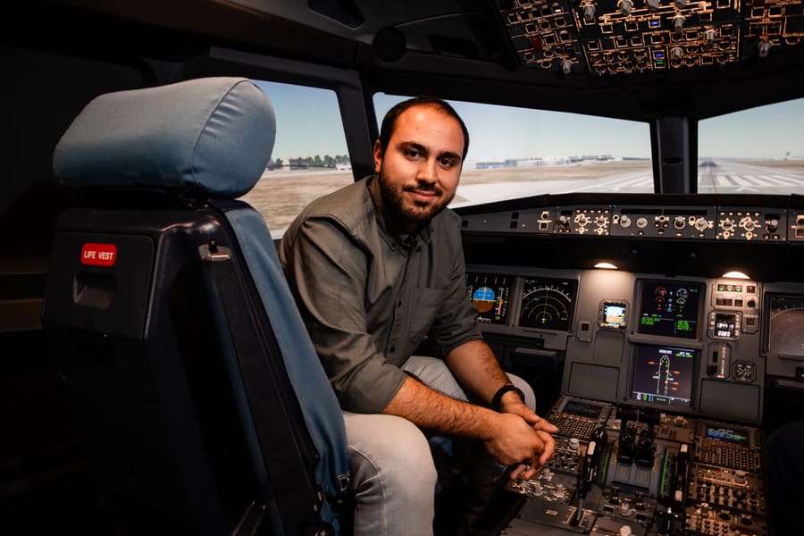 Team member seated in the A320 simulator cockpit